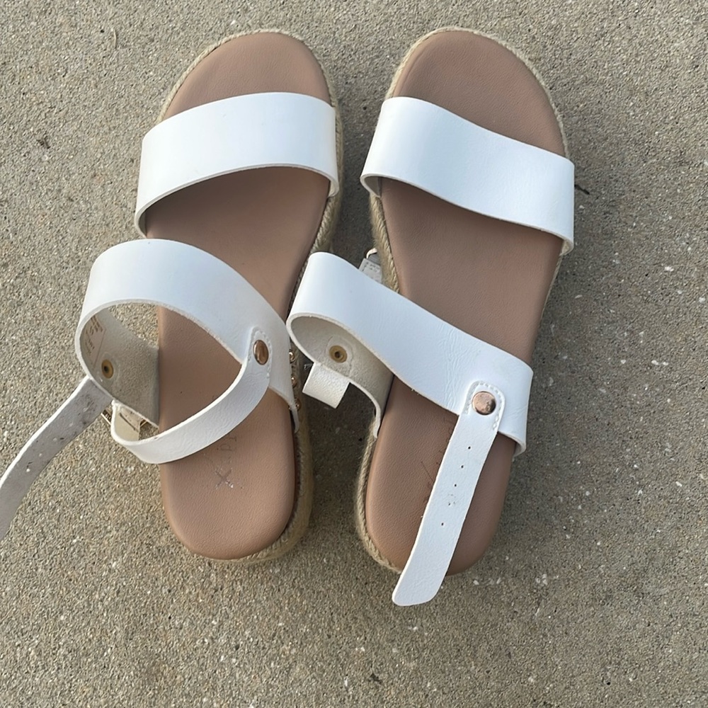 White and light brown sandals